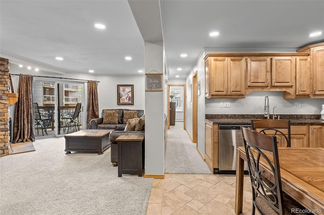 4400 Lodgepole Cir Unit 101, Silverthorne, CO 80498 - kitchen featuring stainless steel dishwasher, light colored carpet, recessed lighting, a sink, and baseboards
