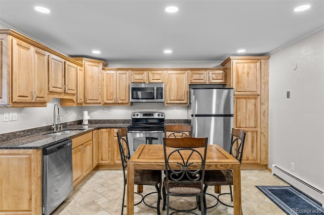 4400 Lodgepole Cir Unit 101, Silverthorne, CO 80498 - kitchen featuring appliances with stainless steel finishes, a sink, a baseboard radiator, recessed lighting, and dark stone counters