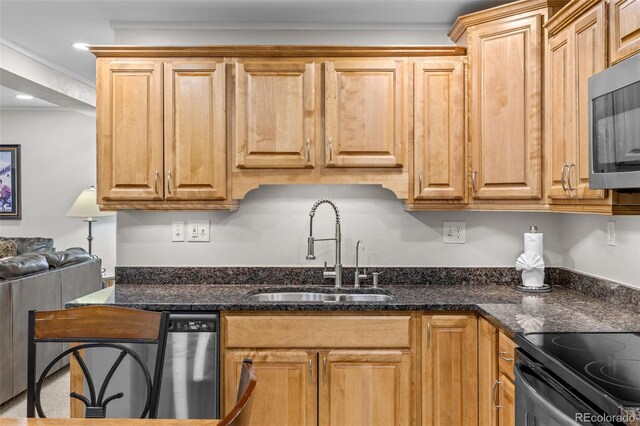 4400 Lodgepole Cir Unit 101, Silverthorne, CO 80498 - kitchen with a sink, appliances with stainless steel finishes, dark stone countertops, and recessed lighting