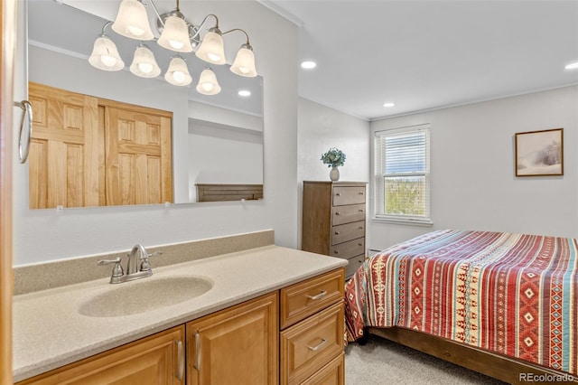 4400 Lodgepole Cir Unit 101, Silverthorne, CO 80498 - bathroom featuring vanity, crown molding, and recessed lighting