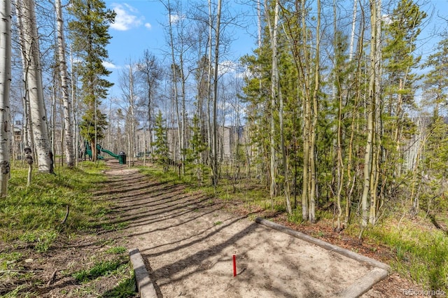 4400 Lodgepole Cir Unit 101, Silverthorne, CO 80498 - surrounding community featuring a playground and a wooded view