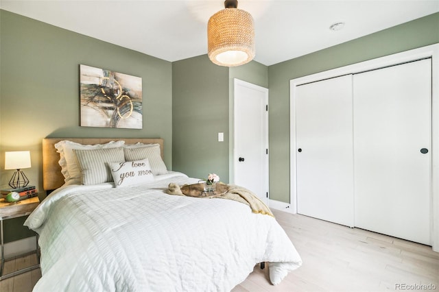 3625 W 9th Ave, Denver, CO 80204 - bedroom featuring light wood-type flooring and a closet