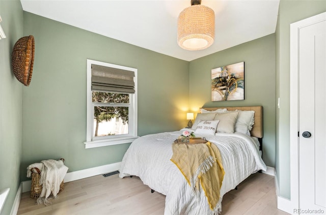 3625 W 9th Ave, Denver, CO 80204 - bedroom with wood finished floors and baseboards