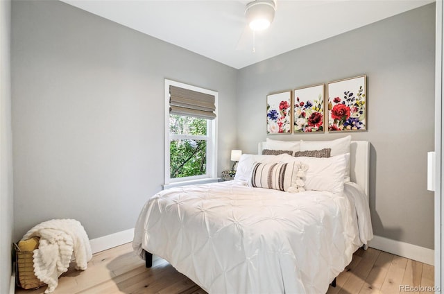 3625 W 9th Ave, Denver, CO 80204 - bedroom featuring baseboards, light wood finished floors, and a ceiling fan