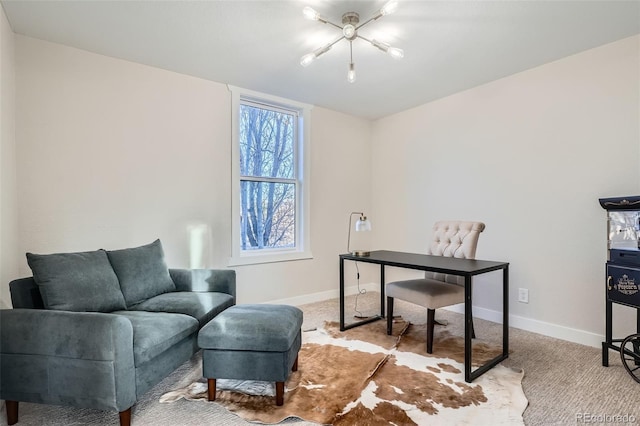 office space featuring a notable chandelier, baseboards, and carpet