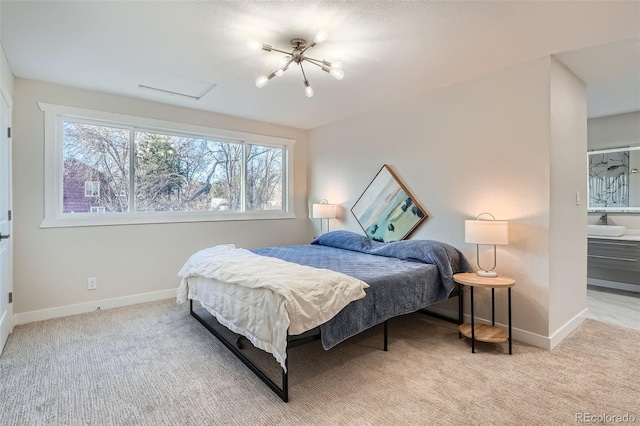 bedroom with light carpet and baseboards