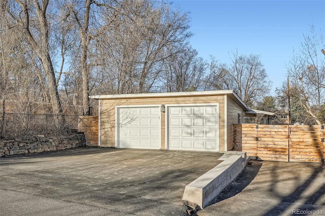 detached garage with fence