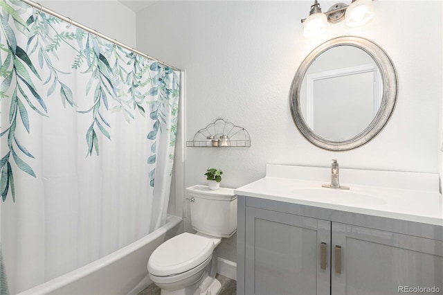 full bathroom with shower / tub combo, vanity, and toilet