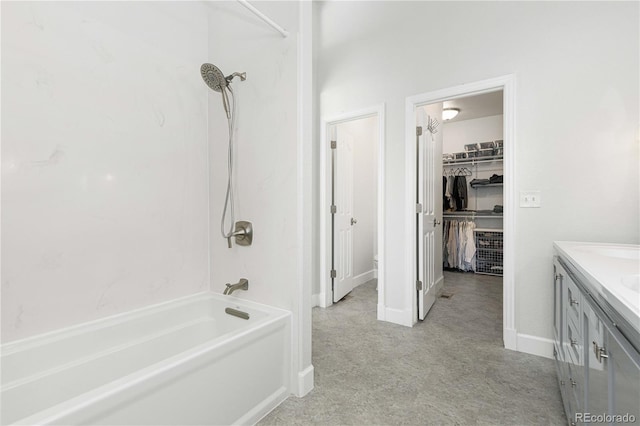 bathroom with vanity and shower / washtub combination