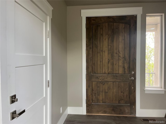 485 Cardiff Cir, Colorado Springs, CO 80906 - entryway featuring healthy amount of natural light, wood finished floors, and baseboards