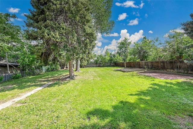 1552 W Caley Ave, Littleton, CO 80120 - fenced backyard with a patio
