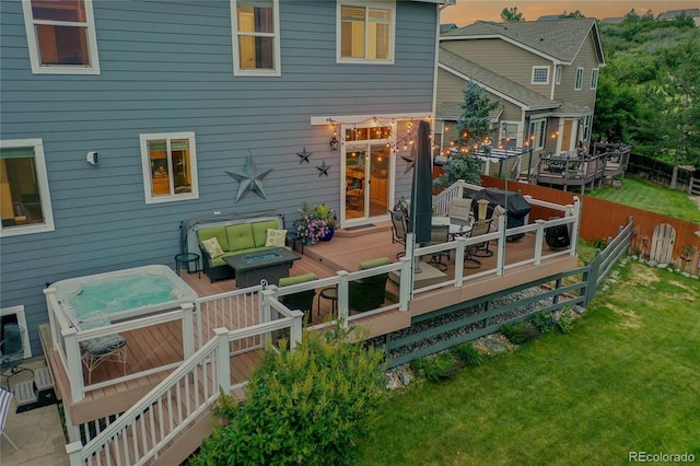 4069 Copper Ct, Castle Rock, CO 80104 - rear view of property with a deck, a hot tub, and an outdoor living space with a fire pit
