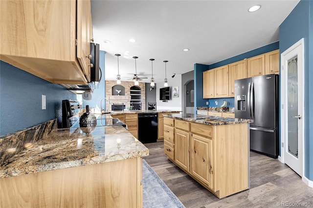 4069 Copper Ct, Castle Rock, CO 80104 - kitchen with stainless steel fridge with ice dispenser, light brown cabinetry, black dishwasher, ceiling fan, and a peninsula