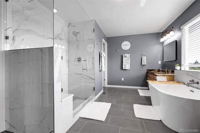 4069 Copper Ct, Castle Rock, CO 80104 - full bathroom featuring a marble finish shower, a soaking tub, vanity, and tile patterned floors
