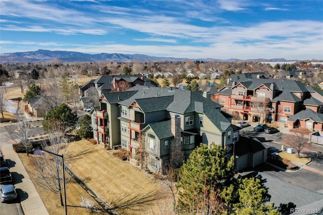 aerial view featuring a mountain view and a residential view