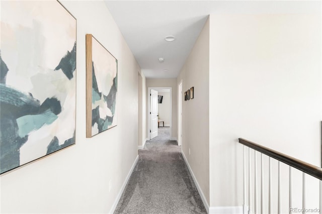 7678 S Old Hammer Way, Aurora, CO 80016 - hallway featuring carpet floors and baseboards