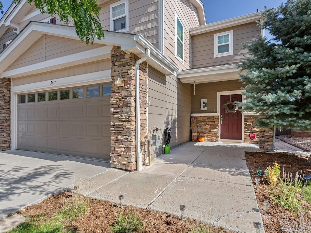 view of front of property with a garage