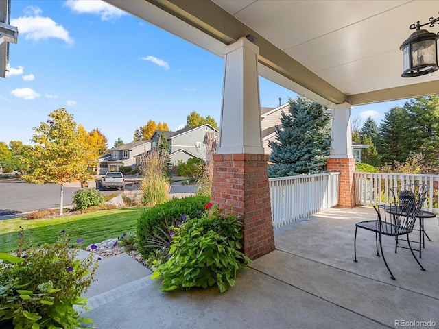 view of patio featuring a porch