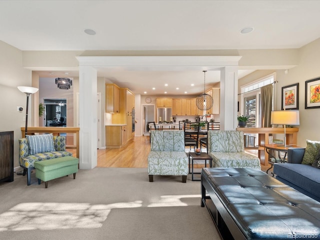 living room featuring light colored carpet