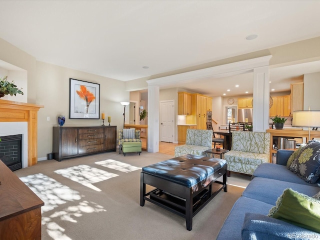 living room featuring light carpet