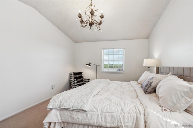 7822 W Ottawa Pl, Littleton, CO 80128 - carpeted bedroom with a chandelier, lofted ceiling, and baseboards