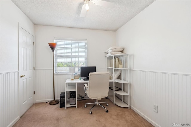7822 W Ottawa Pl, Littleton, CO 80128 - carpeted office space with wainscoting, a ceiling fan, and a textured ceiling