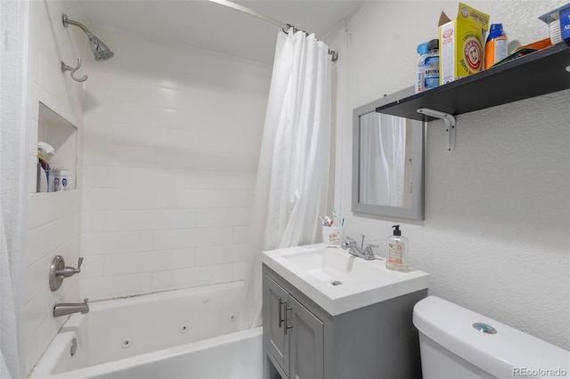 358 S Osceola St, Denver, CO 80219 - bathroom with a combined bath / shower with jetted tub, toilet, vanity, and a textured wall
