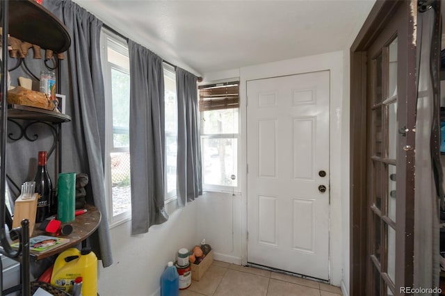 358 S Osceola St, Denver, CO 80219 - entrance foyer with light tile patterned flooring