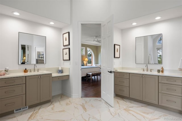 120 Silver Leaf Way, Castle Rock, CO 80108 - bathroom with marble look tiles, connected bathroom, two vanities, recessed lighting, and ceiling fan