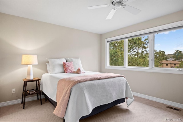 120 Silver Leaf Way, Castle Rock, CO 80108 - bedroom featuring baseboards, light colored carpet, and a ceiling fan