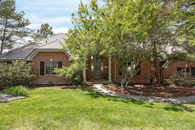 120 Silver Leaf Way, Castle Rock, CO 80108 - obstructed view of property featuring a front yard and brick siding