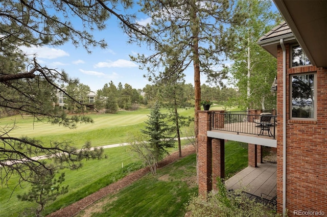 120 Silver Leaf Way, Castle Rock, CO 80108 - view of grassy yard featuring a wooden deck and golf course view