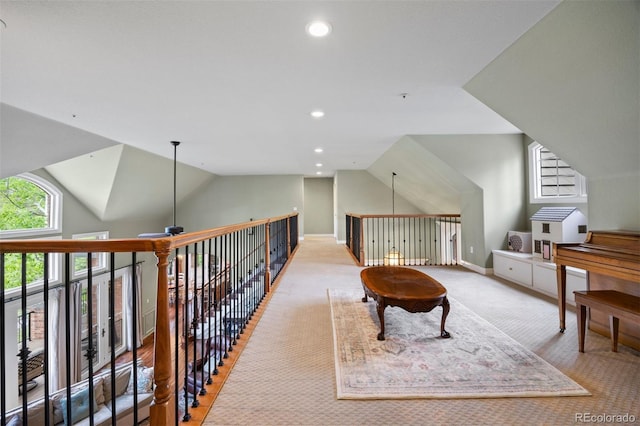 120 Silver Leaf Way, Castle Rock, CO 80108 - living area featuring light colored carpet, lofted ceiling, an upstairs landing, recessed lighting, and baseboards