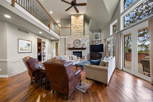 120 Silver Leaf Way, Castle Rock, CO 80108 - living area featuring a towering ceiling, ceiling fan, a fireplace, hardwood / wood-style flooring, and recessed lighting