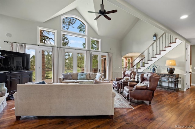 120 Silver Leaf Way, Castle Rock, CO 80108 - living area featuring high vaulted ceiling, a ceiling fan, stairs, hardwood / wood-style flooring, and arched walkways