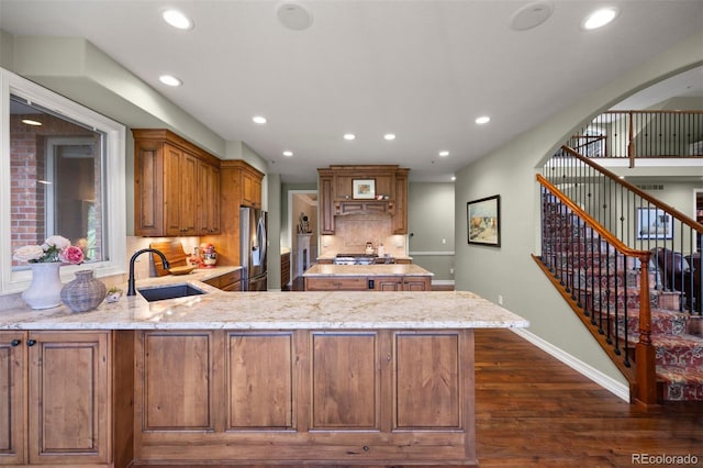 120 Silver Leaf Way, Castle Rock, CO 80108 - kitchen with a sink, stainless steel appliances, dark wood-style flooring, recessed lighting, and light stone countertops