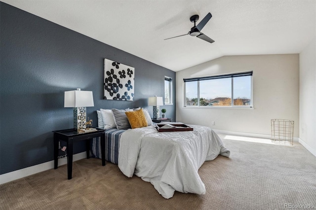 carpeted bedroom featuring ceiling fan and lofted ceiling