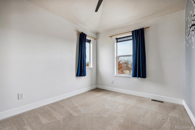 unfurnished room featuring carpet flooring