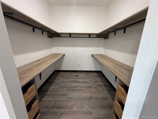 104 Dotson St, Manassa, CO 81141 - walk in closet featuring dark wood-type flooring