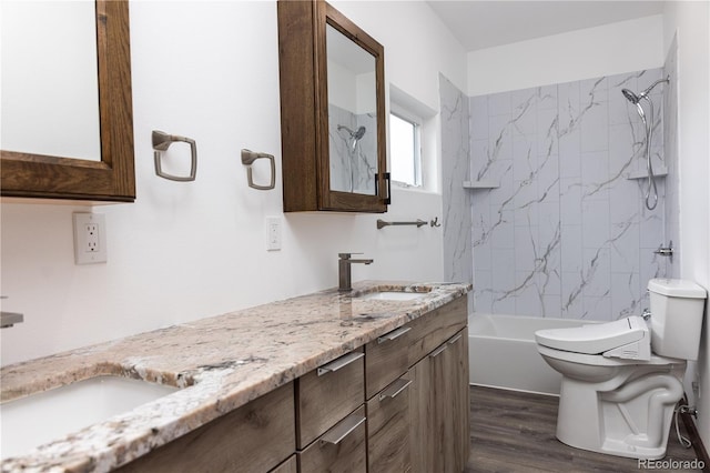 104 Dotson St, Manassa, CO 81141 - bathroom featuring double vanity, wood finished floors, and shower / tub combination