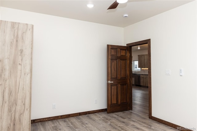 104 Dotson St, Manassa, CO 81141 - spare room with a smoke detector, a ceiling fan, and light wood-type flooring