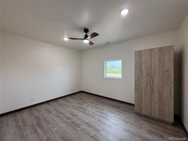 104 Dotson St, Manassa, CO 81141 - spare room featuring ceiling fan and wood finished floors