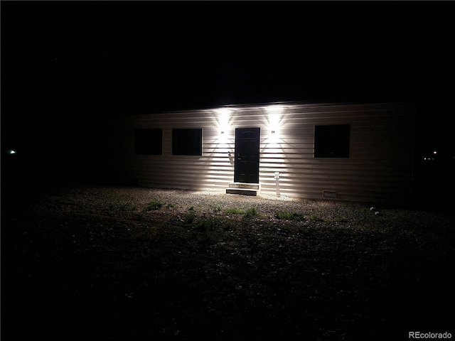 104 Dotson St, Manassa, CO 81141 - view of back of house at night