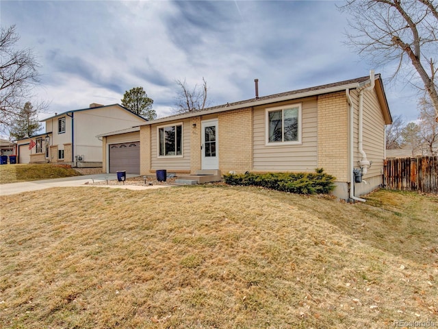 ranch-style house with brick siding, an attached garage, a front lawn, fence, and driveway