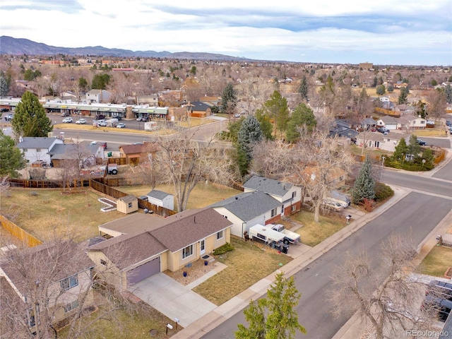 drone / aerial view featuring a mountain view and a residential view