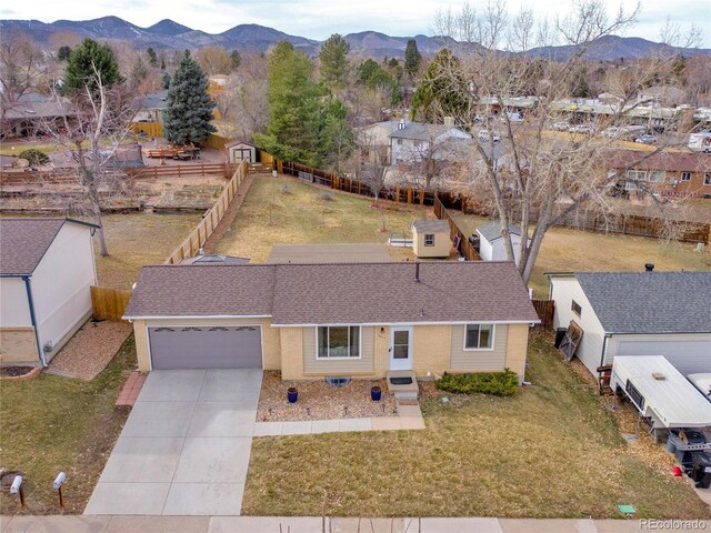 6523 S Field Way, Littleton, CO 80123 - aerial view of property and surrounding area with a mountain backdrop