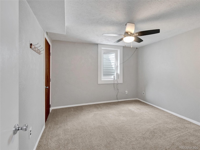 6523 S Field Way, Littleton, CO 80123 - spare room with ceiling fan, carpet flooring, and a textured ceiling