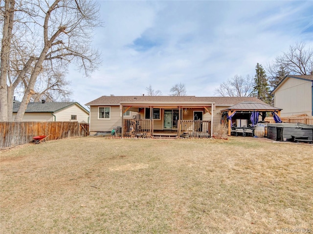 6523 S Field Way, Littleton, CO 80123 - rear view of house with a gazebo, a porch, and roof with shingles