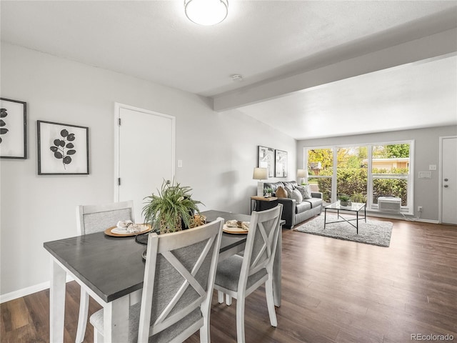5995 Estes St, Arvada, CO 80004 - dining area with beam ceiling, dark wood finished floors, and baseboards