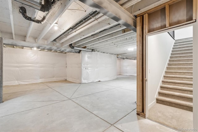 unfinished basement with stairway